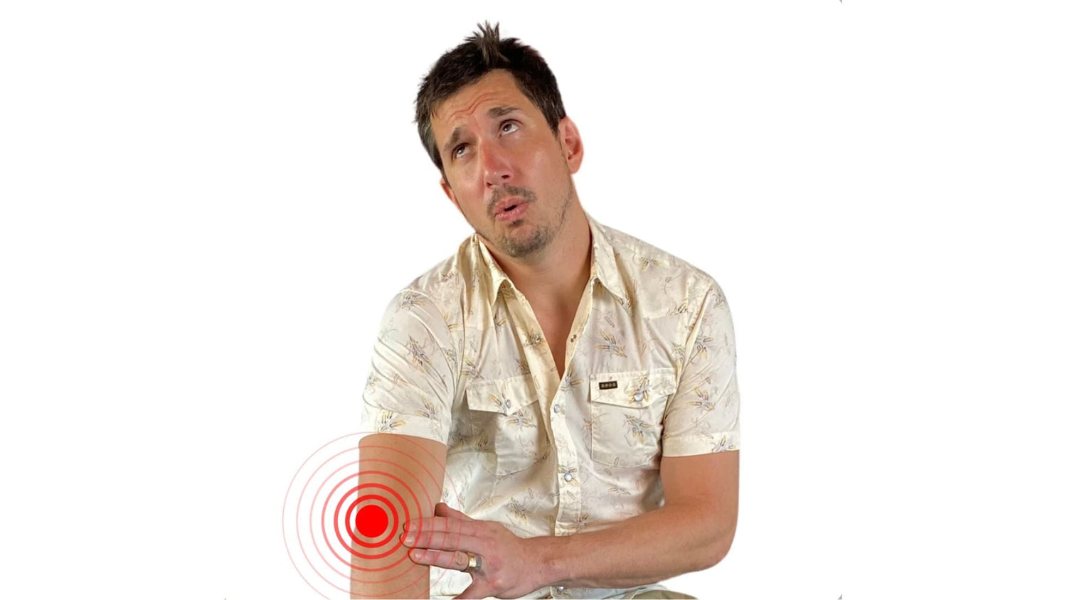 Man in light floral shirt treating tennis elbow