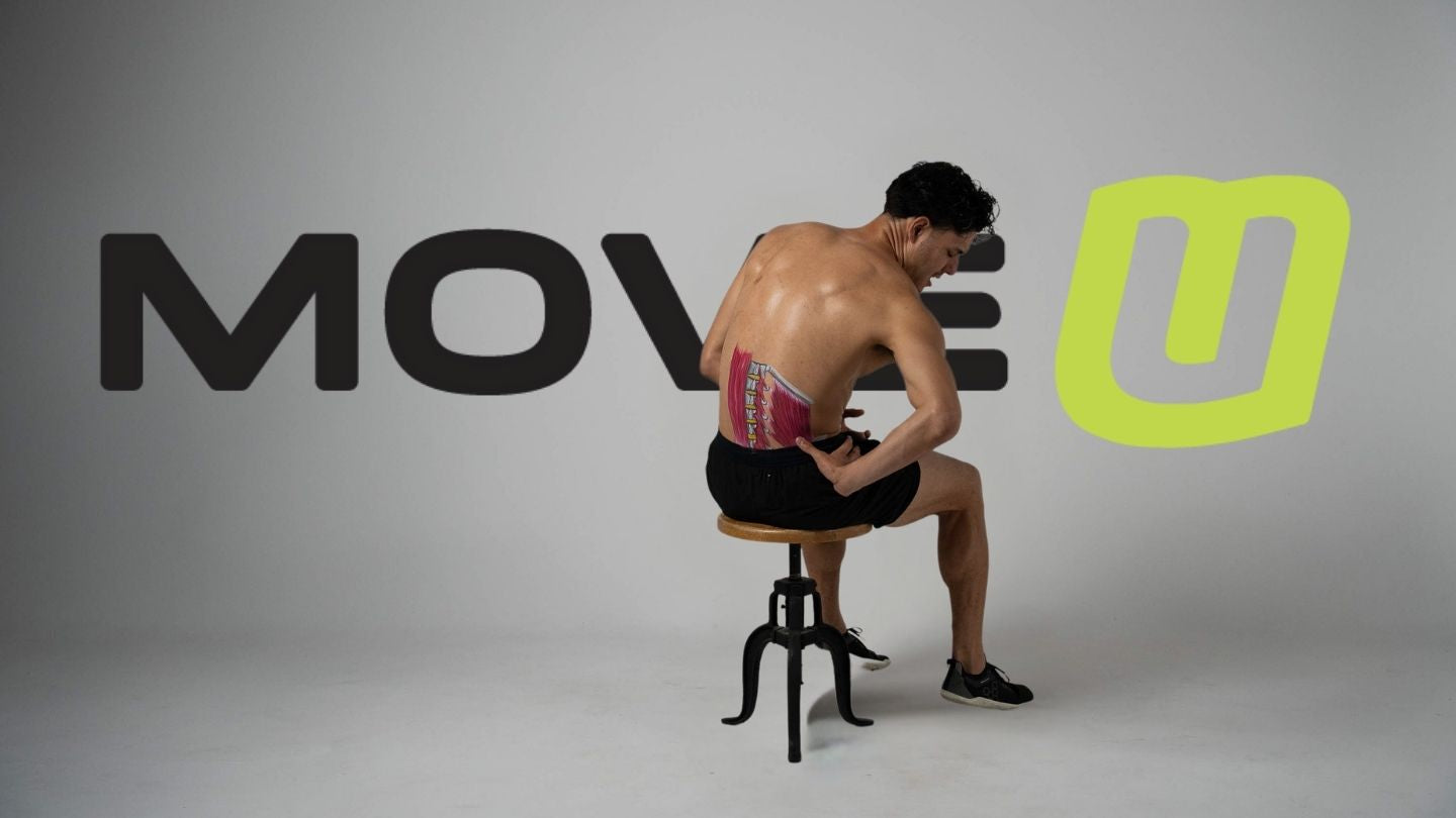 image of man holding his side because of back pain