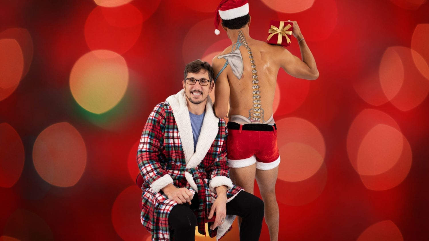 Dr. Mike and MoveU model in holiday gift costumes